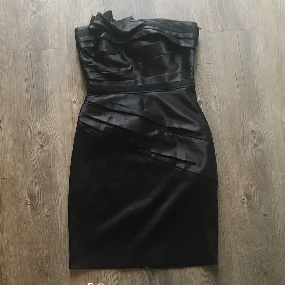 Black strapless dress.